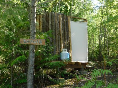 Coin operated hot shower