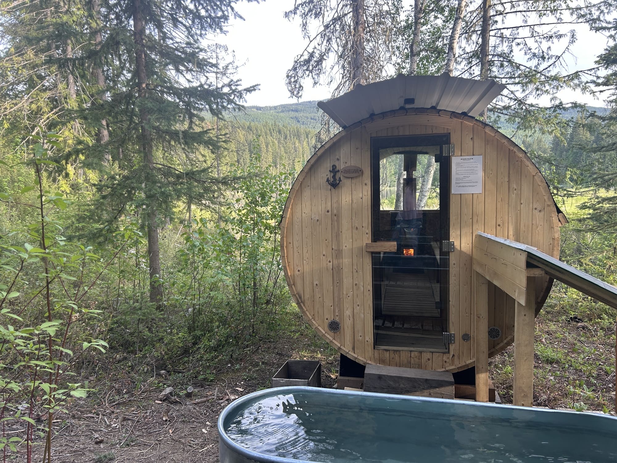 Wood fired sauna by the lake, with cold plunge tub