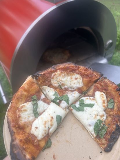 Freshly baked pizza from the wood-fired oven